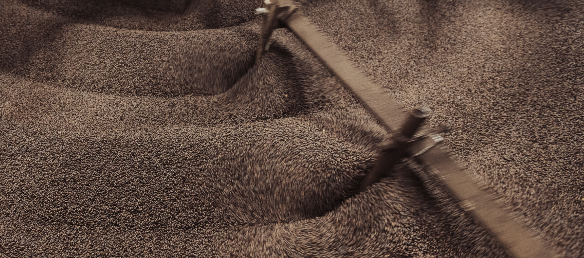 Machinery blades mixing malt in a Viking Malt malt house